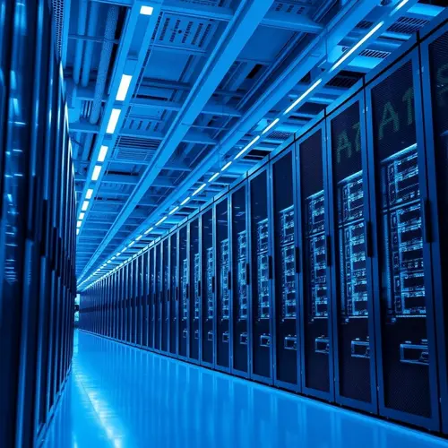 Image depicting a modern server room with multiple rows of tall, dark server racks under cool blue lighting.