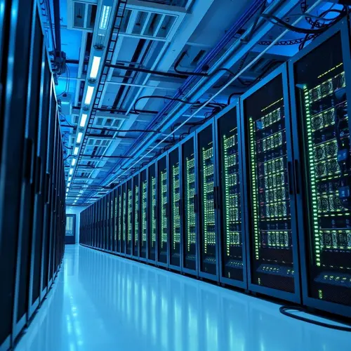 Rows of servers and networking equipment in a modern data center, illustrating technological infrastructure.