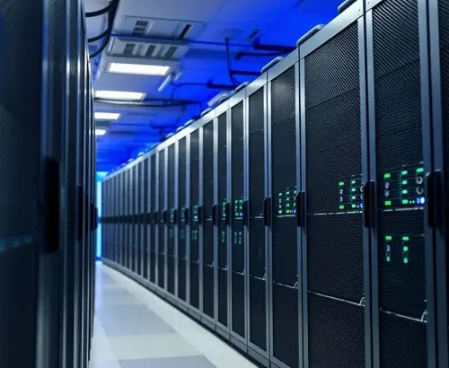 Image of server racks and cooling systems in a modern data center.