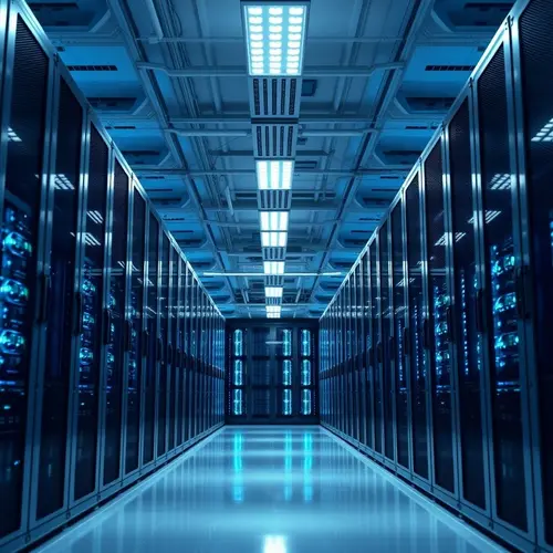 Rows of server racks in a modern data center facility.