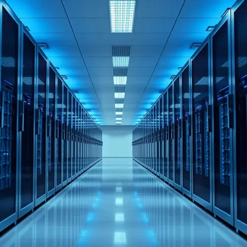 Image depicting a clean, modern data center environment with server racks and blue lighting.