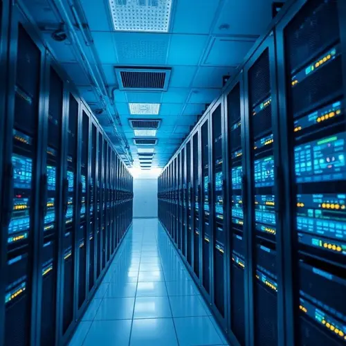 Rows of server racks in a modern data center with cool lighting.