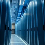 Detailed view of server racks in a modern data center with cool lighting.