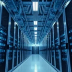 Image depicting the interior of a large data center with rows of server racks, representing digital infrastructure.