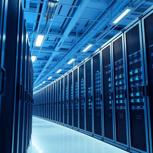 Server racks in a data center, representing digital infrastructure.