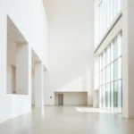 A minimalist architectural scene with clean lines and modern materials, representing contemporary design.