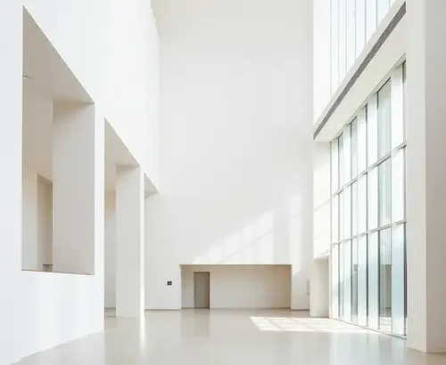 A minimalist architectural scene with clean lines and modern materials, representing contemporary design.